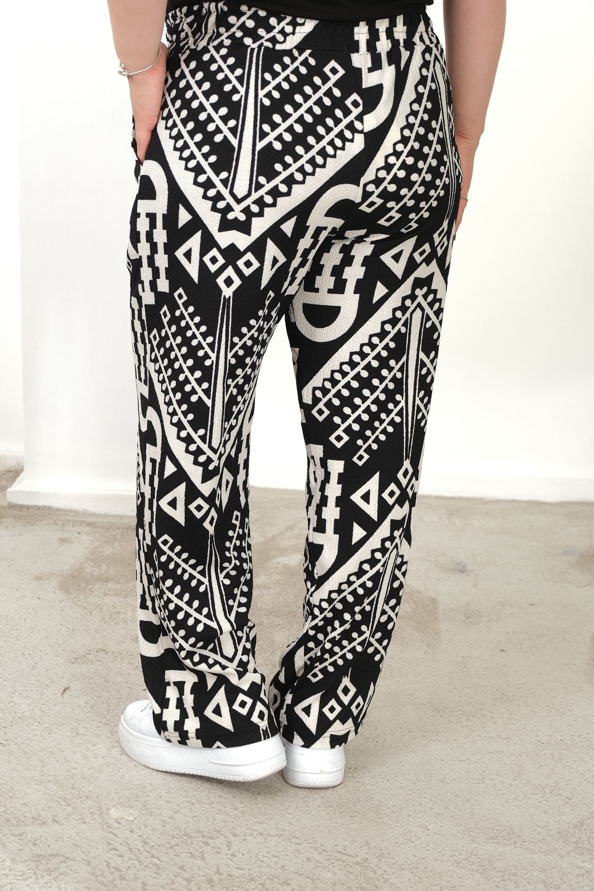 RENKTE BÜYÜK BEDEN CEPLİ BELİ LASTİKLİ BOL PAÇA PANTALON