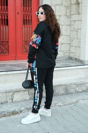 RENKTE BÜYÜK BEDEN DESEN DETAY TASARIM EŞOFMAN TAKIMI