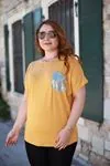 RENKTE SIRT VE CEBİ METALİZE SARI BLUZ