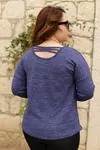 RENKTE LEOPAR CEPLİ SIRTI BİYELİ LACİVERT TRİKO BLUZ