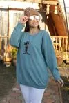 RENKTE ÖNÜ KIZ NAKIŞLI MİNT SWEAT