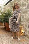 RENKTE CEPLİ ESNEK GENİŞ KESİM ELBİSE