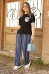 RENKTE CEP GARNİLİ SİYAH BLUZ