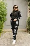 RENKTE KOL VE YANLARI ŞERİTLİ SİYAH EŞOFMAN TAKIM