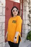RENKTE GENİŞ KESİM OFF YAZILI TURUNCU TSHİRT