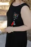 RENKTE KALIN ASKILI ÖNÜ ARMALI SİYAH ELBİSE