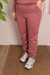 RENKTE GENİŞ KESİM PUDRA PEMBE EŞOFMAN TAKIMI