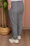 RENKTE GENİŞ KESİM DAR PAÇA DESENLİ SÜET PANTOLON
