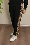 RENKTE ORTASI LEOPAR DESENLİ SİYAH EŞOFMAN TAKIMI