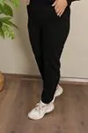 RENKTE ORTASI SİMLİ SİYAH EŞOFMAN TAKIMI