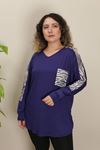 RENKTE OMUZLARI VE YAKASI ZEBRA PULLU LACİVERT BLUZ