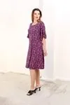 RENKTE GENİŞ KESİM KOLU VOLANLI DESENLİ ELBİSE