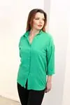 RENKTE GENİŞ KESİM KOYU YEŞİL GÖMLEK