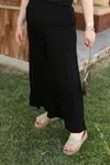 RENKTE GENİŞ KESİM SİYAH ETEK PANTOLON