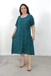 RENKTE BÜYÜK BEDEN GENİŞ KESİM DESENLİ ELBİSE