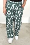 RENKTE BÜYÜK BEDEN CEPLİ BELİ LASTİKLİ  BOL PAÇA PANTALON