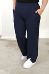 RENKTE BÜYÜK BEDEN CEPLİ BELİ LASTİKLİ LACİVERT BOL PAÇA PANTALON